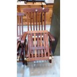 A hardwood steamer chair