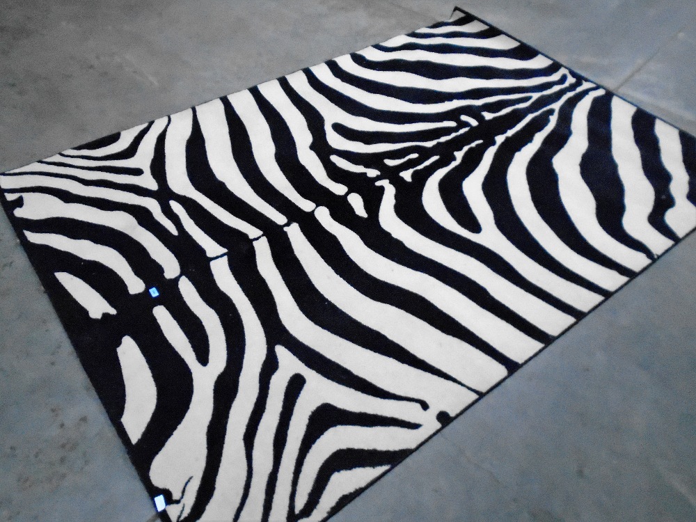 A rug of modernist zebra design. 2m x 2.9m