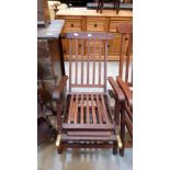 A hardwood steamer chair