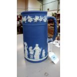 A Wedgwood blue jasperware jug. 8½'' high