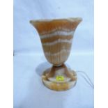 An alabaster table lamp of urn form. 13'' high