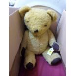 A mid-20th century gold plush teddy bear. 16'' high