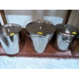 Two stainless steel breadbins and a bucket