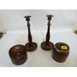 A pair of 1930's Yancarran wood candlesticks, a biscuit jar and tea jar with covers