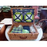 A Optima picnic set in wicker hamper