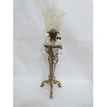 A fine Victorian gilt brass oil lamp, with duplex burner, clear glass fount and vaseline shade,
