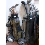 Two sets of golf clubs and sundries