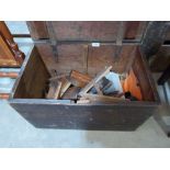 A pine box with wood planes