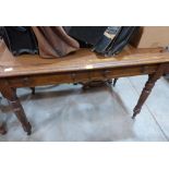 A Victorian oak writing table with inlet top over two frieze drawers. 48' wide