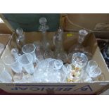 A collection of drinking glasses and decanters