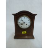 An Edward VII mahogany and line inlaid mantle clock with French 8 day brass drum movement. 10' high