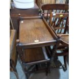 An oak barleytwist two tier tea trolley