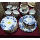 A Moore pottery blue and white part tea service comprising 36 pieces