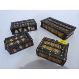 Four ebony and porcupine quill boxes