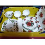 A 19 piece tea service by Adderley China 'Holly and Ivy' and six pieces of Christmas china