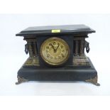 A mantle clock in painted wood architectural case. 18' wide