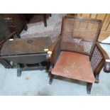 An oak dropleaf occasional table and a 1930s caned chair