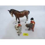 A Beswick stallion, tan gloss glaze and two Beswick Norman Thelwell horse and rider groups, one