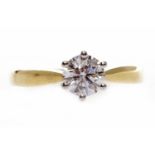 EIGHTEEN CARAT GOLD DIAMOND SOLITAIRE RING set with a round brilliant cut diamond of approximately