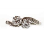 EARLY TWENTIETH CENTURY EIGHTEEN CARAT WHITE GOLD DIAMOND TWO STONE RING with two round brilliant