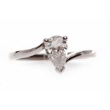 PLATINUM DIAMOND SOLITAIRE RING set with a pear shaped diamond of approximately 0.