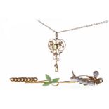 EDWARDIAN NINE CARAT GOLD GEM AND SEED PEARL SET PENDANT openwork, set with two oval green gems,