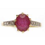 EIGHTEEN CARAT GOLD DIAMOND AND RUBY RING the oval ruby of approximately 1.
