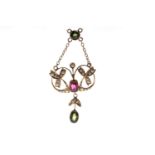 EDWARDIAN NINE CARAT GOLD GEM SET NECKLET openwork and sinuous in form,