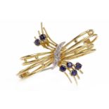 EIGHTEEN CARAT GOLD DIAMOND AND GEM SET BROOCH in the form of a bow,
