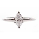 FOURTEEN CARAT GOLD DIAMOND SOLITAIRE RING the marquise cut diamond of approximately 0.