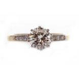 EIGHTEEN CARAT GOLD DIAMOND SOLITAIRE RING the round brilliant cut diamond of approximately 1.