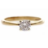 NINE CARAT GOLD DIAMOND SOLITAIRE RING set with a round brilliant cut diamond of approximately 0.