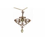 EDWARDIAN NINE CARAT GOLD GEM AND PEARL PENDANT openwork and set with a single round green paste