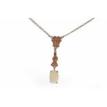 EARLY TWENTIETH CENTURY CONTINENTAL NINE CARAT GOLD OPAL PENDANT with a single oval opal drop,