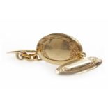 PAIR OF NINE CARAT GOLD CUFFLINKS each of oval form, with machined engraving, 18mm long, 12.