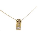 EIGHTEEN CARAT GOLD GEM SET PENDANT of overall rectangular form,