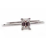 EIGHTEEN CARAT GOLD DIAMOND SOLITAIRE RING set with an emerald cut diamond of approximately 0.