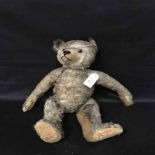 EARLY 20TH CENTURY BLONDE PLUSH TEDDY BEAR with button eyes,