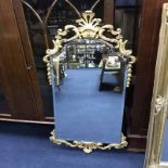 LARGE RECTANGULAR GILT MIRROR and a shield shaped mirror