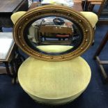 CIRCULAR WALL MIRROR along with a drop leaf table,