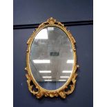 SMALL GILT METAL WALL MIRROR