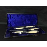 TWO CASED CARVING SETS