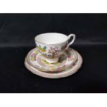 SUSIE COOPER TEA SERVICE along with a part tea service decorated with flowers and gilt;
