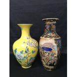 TWO ASIAN VASES one with a yellow background with flowers and bird figure,