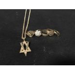 FIVE GOLD RINGS also a Star of David pendant with gold chain