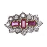 NINE CARAT GOLD RUBY AND DIAMOND RING