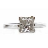 EIGHTEEN CARAT GOLD DIAMOND SOLITAIRE RING set with a princess cut stone of approximately 1.