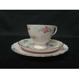 TUSCAN FINE ENGLISH PART TEA SERVICE with floral pattern on a pale pink ground,