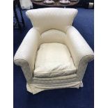 CREAM UPHOLSTERED ARMCHAIR