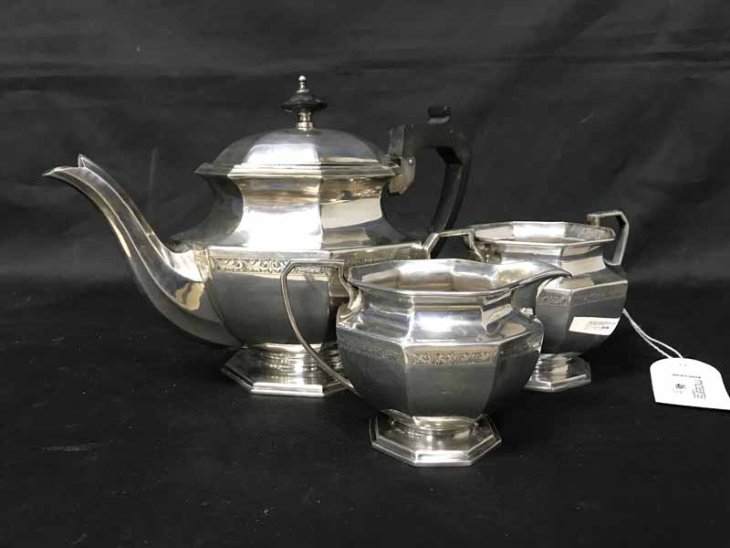 THREE PIECE SILVER PLATED TEA SERVICE of Art Deco design,